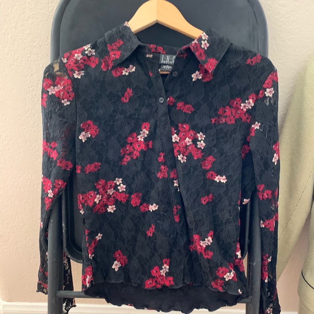 Antique looking black blouse with floral accent